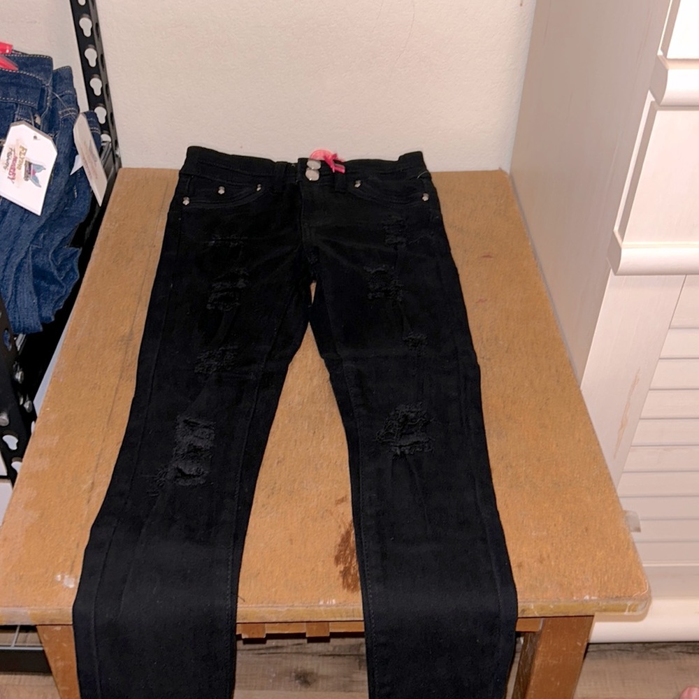 Girls black ripped jeans